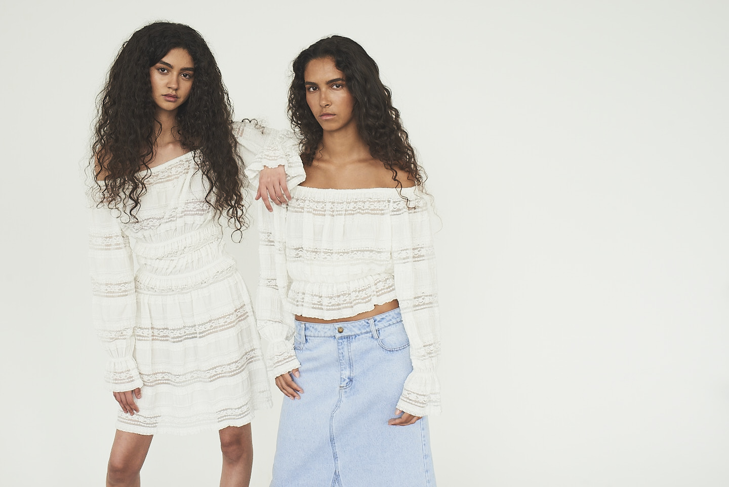 Two girls wearing Designers Remix clothing